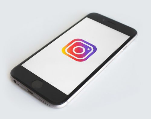 smartphone showing instagram logo on screen